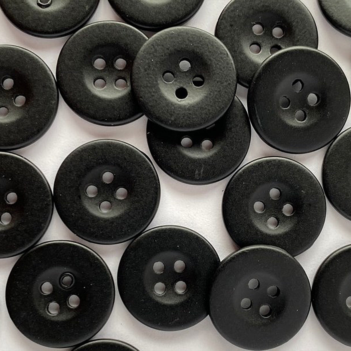 Black coated metal button