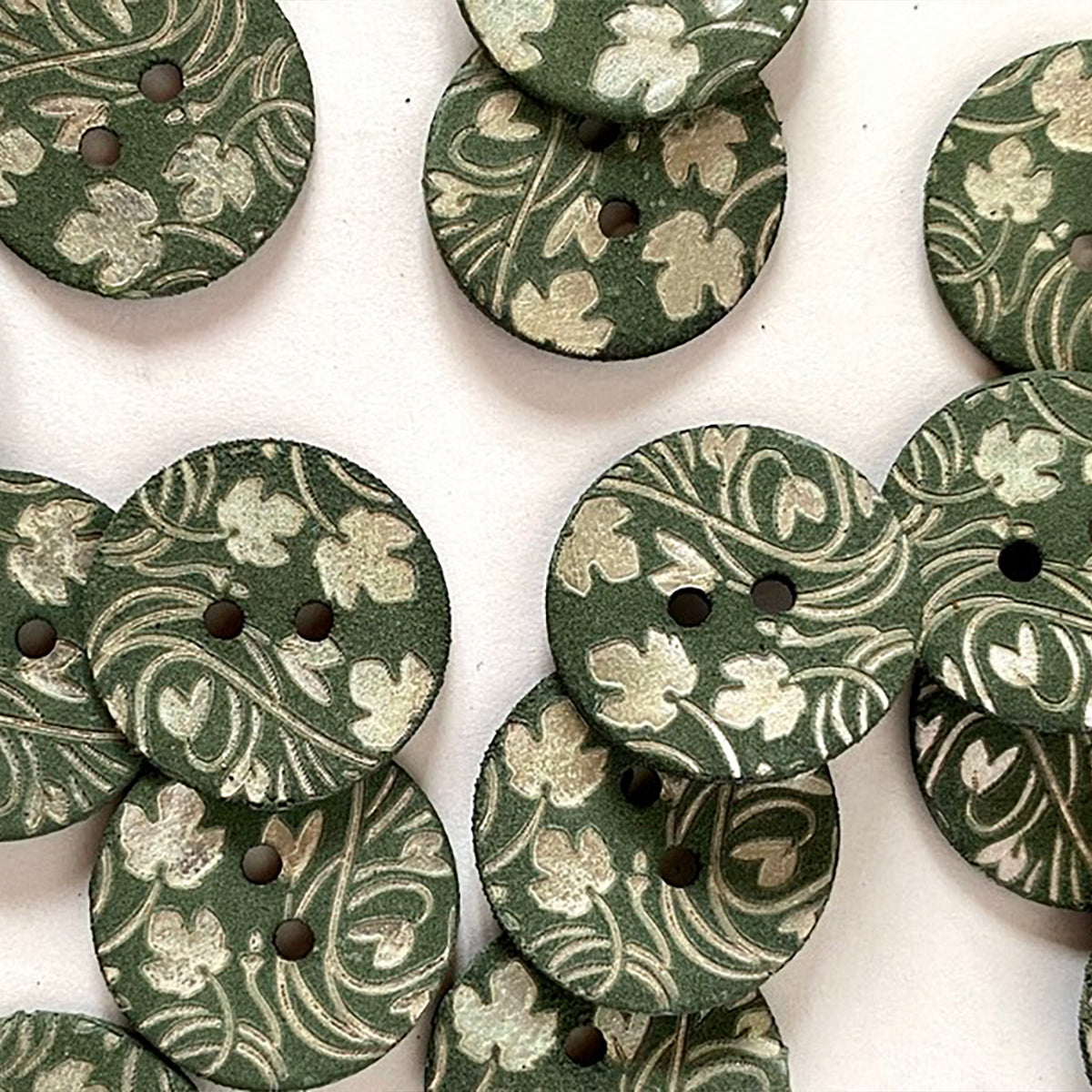 Matt chalky shell greyish green colour laser stem and leaf design button