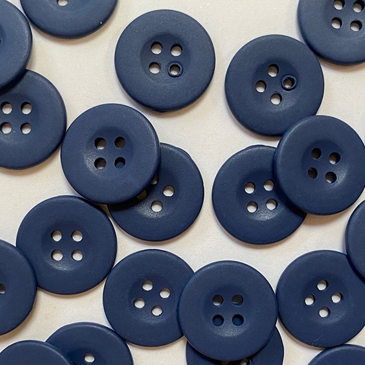 Matt mid blue, light navy metal button