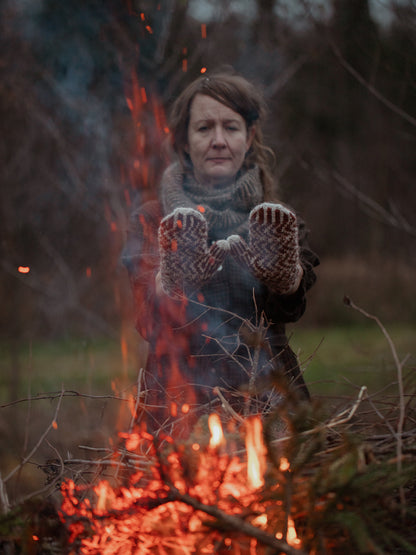 The Island and the Forest: A Knitted Correspondence