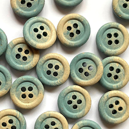 Hemp button, stone colour with pale denim blue fade