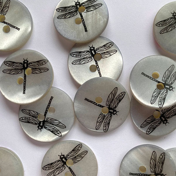 Grey matt shell button with black dragonfly